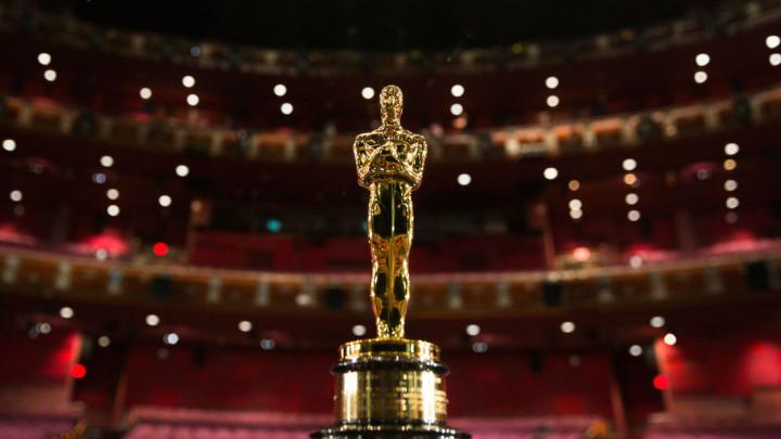An Oscar statue in a theater.