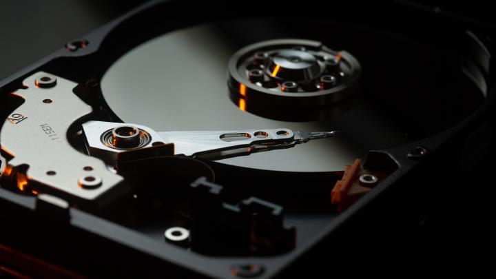 Close up image of the inside of a hard drive.