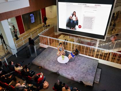 An event showcasing the Lora King Interactive Interview in front of a live audience.