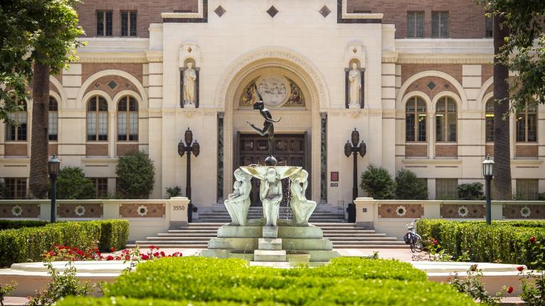 The front of Doheny Memorial Library and the fountain.